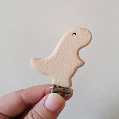Attache-sucette en bois de hêtre naturel - dinosaure
